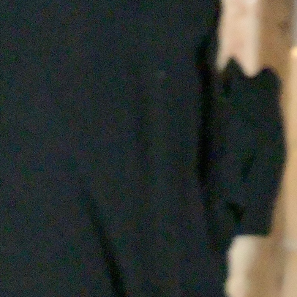 Paige black turtle neck sweater with cut out sleeve